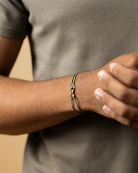 Preview: 1,5 mm grünes Nylonarmband mit einem Titan-Unendlichkeitszeichen - Infinity Green Gold